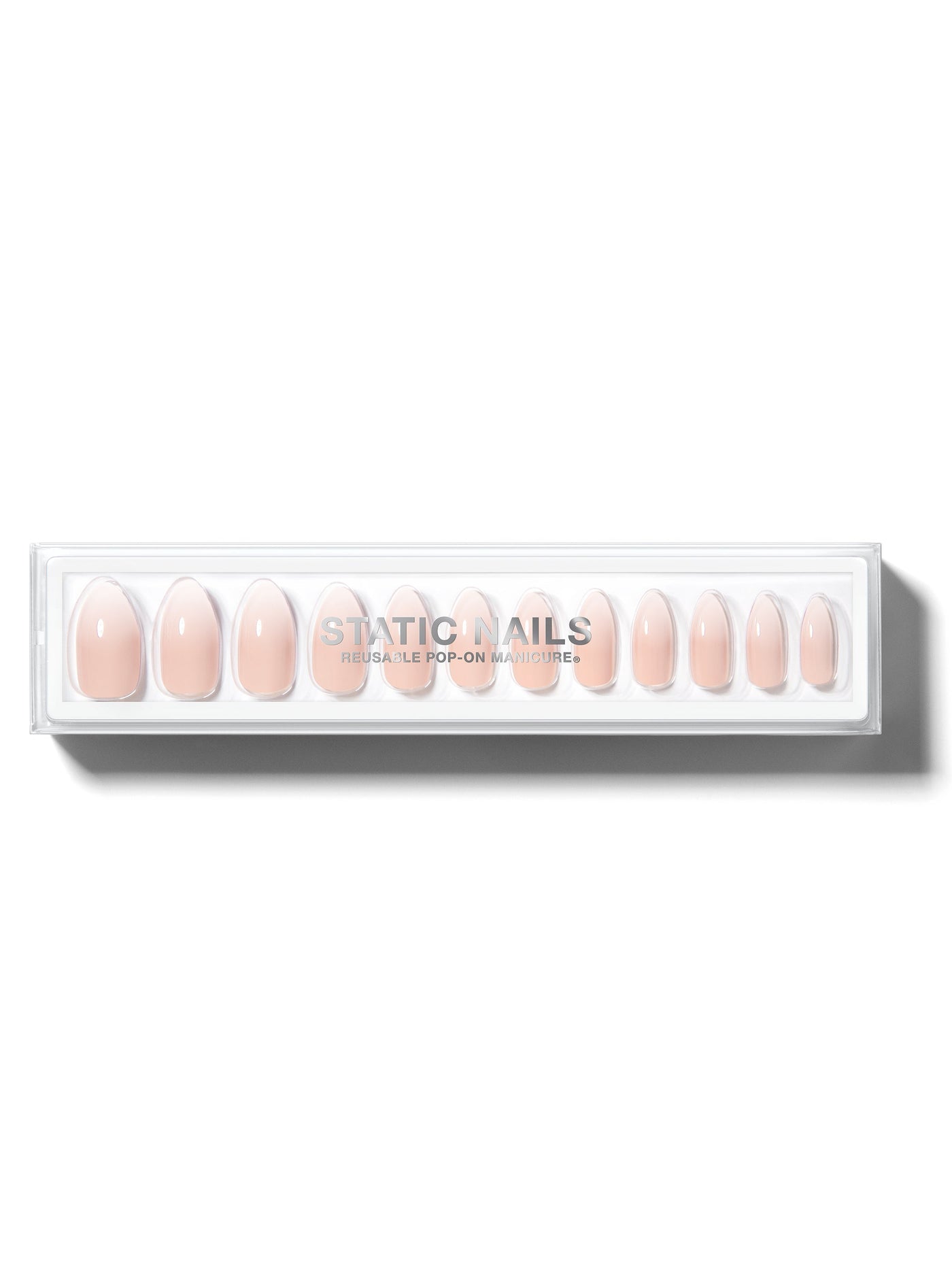 Ombre light pink to white manicure in almond shape,