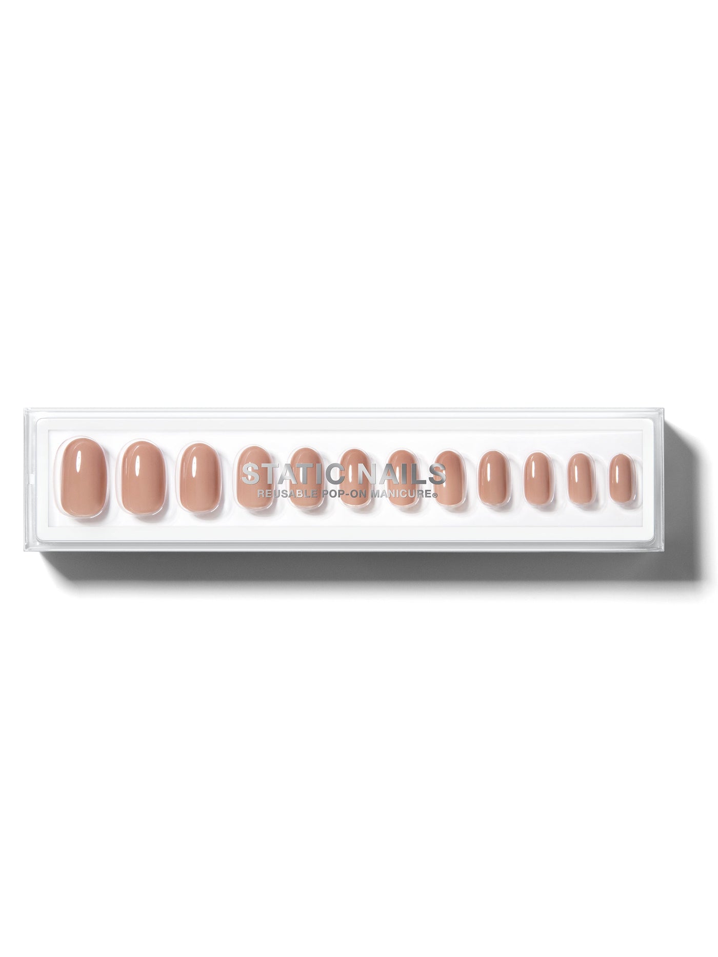 Nude-brown manicure in round shape,