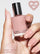 BARELY THERE 5-IN-1 RAPID GROWTH NAIL TREATMENTHand holding a bottle of &
