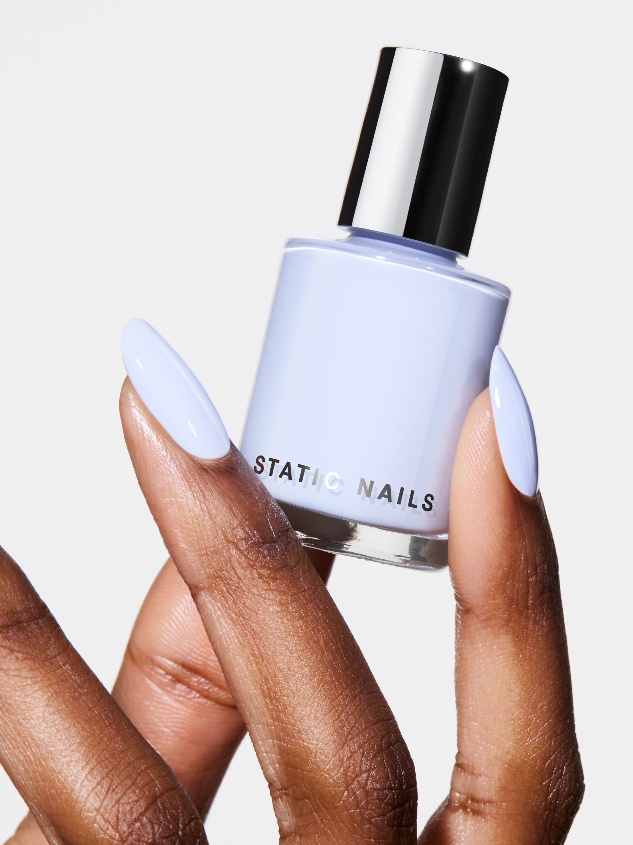 blue bottle of nail polish