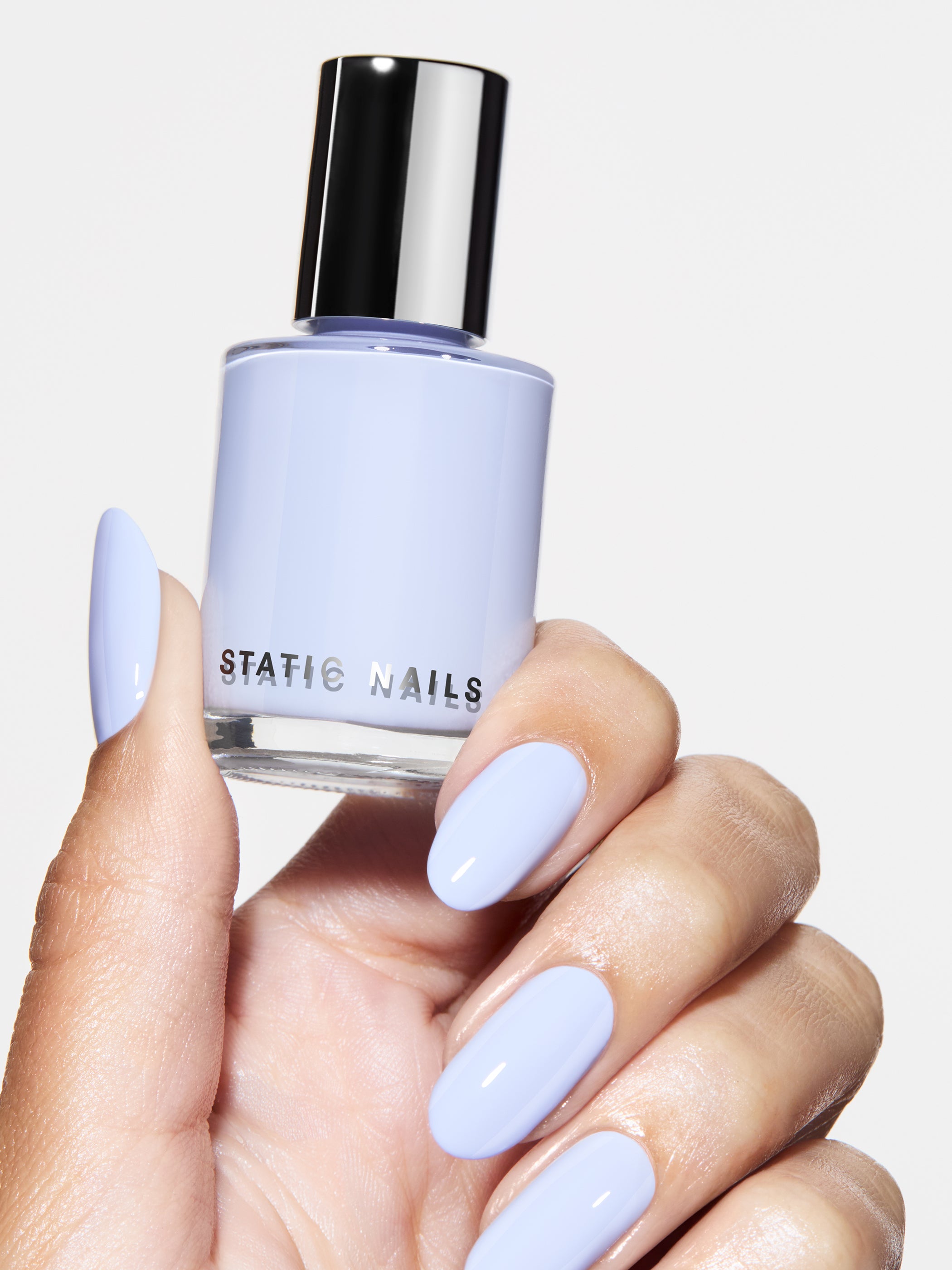 blue bottle of nail polish