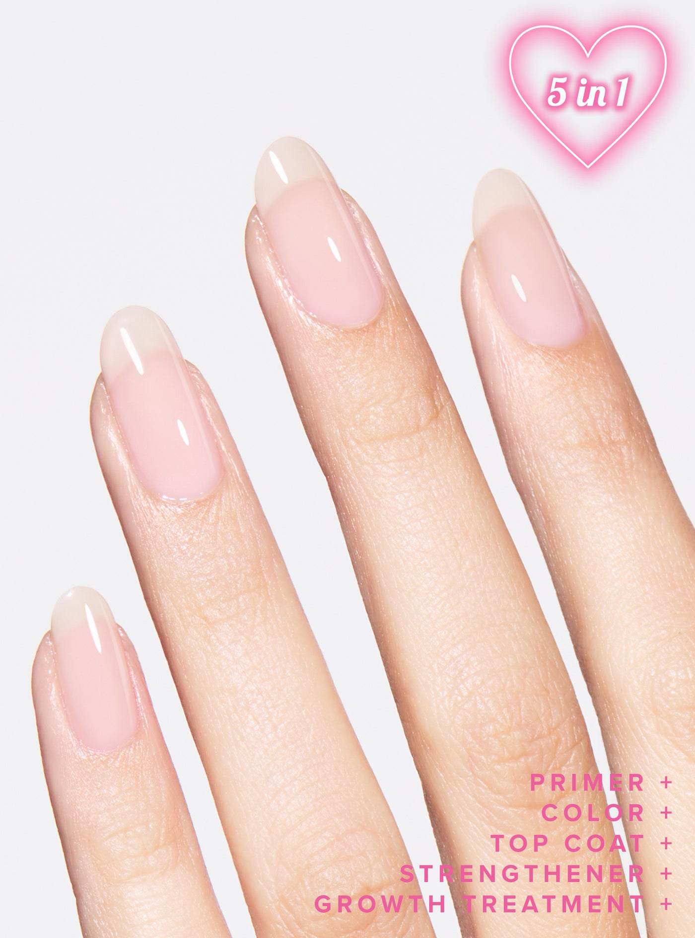 Hand with pink nail polish on a pink background