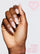 SOFT GIRL PINK 5-IN-1 RAPID GROWTH NAIL TREATMENTHand with pink nail polish on a light gray background