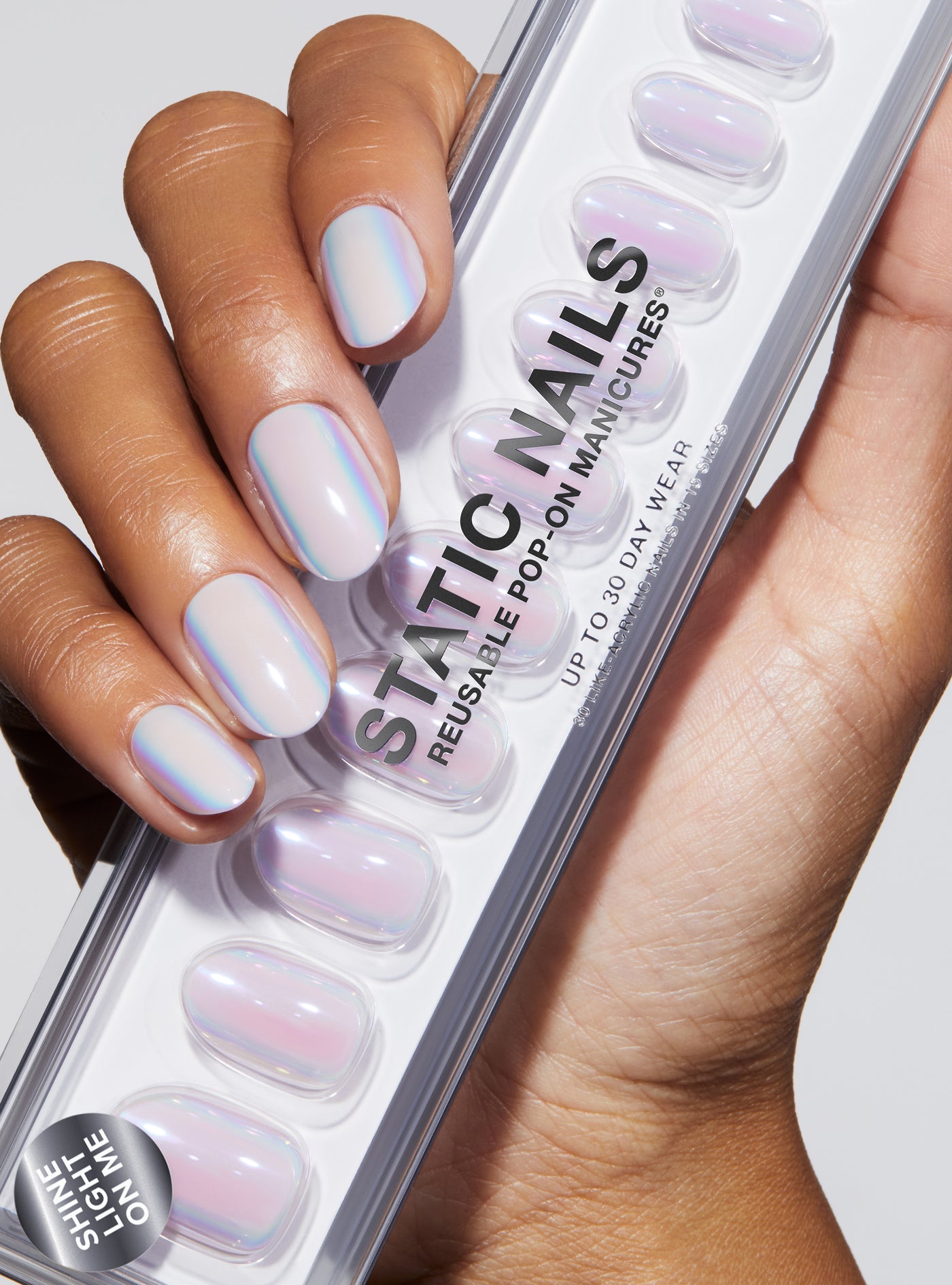 Lavender holographic effect manicure in round shape,