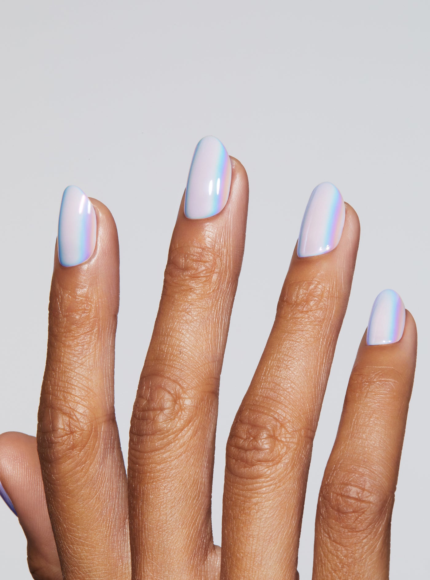 Lavender holographic effect manicure in round shape,