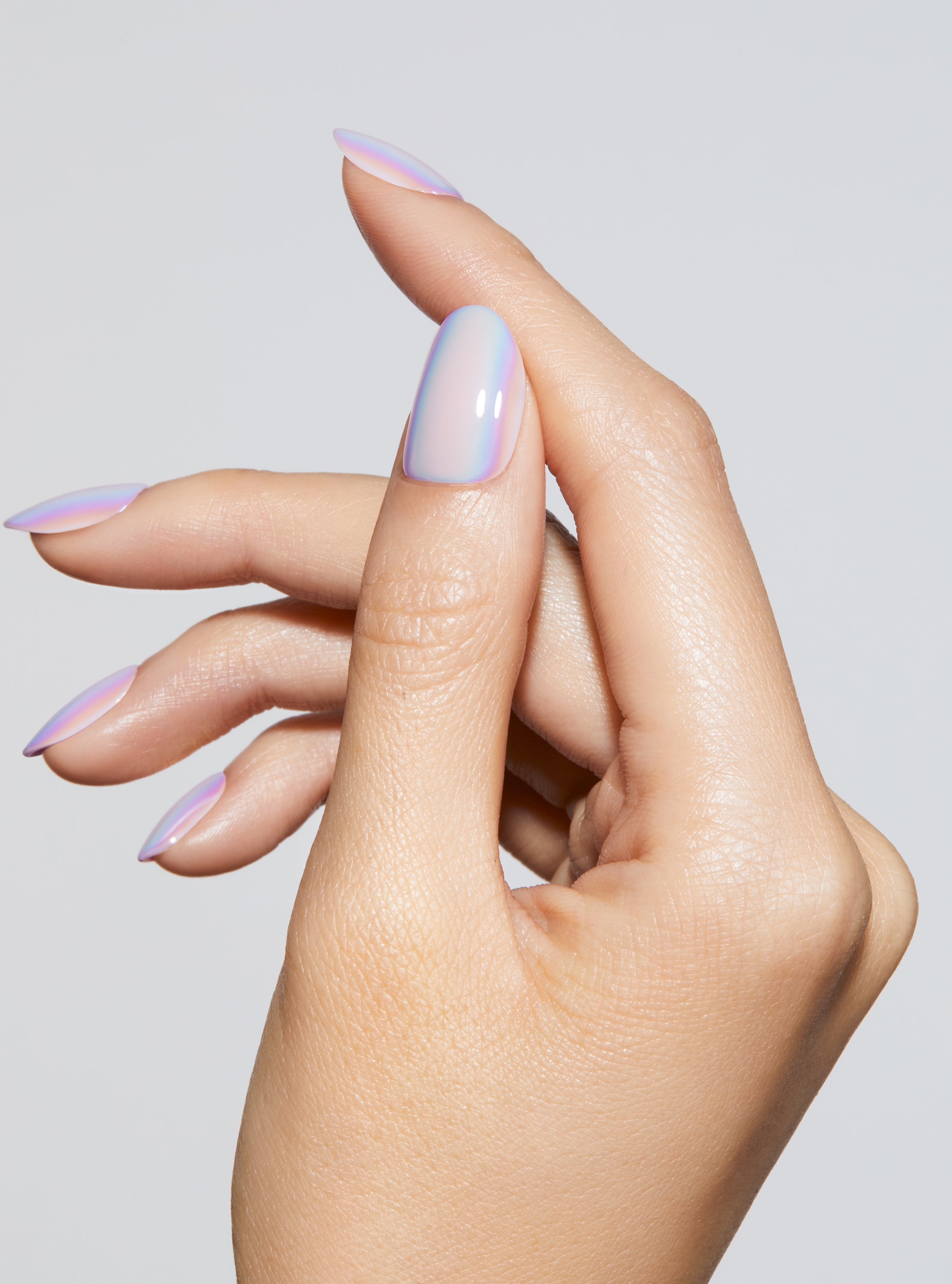 Lavender holographic effect manicure in round shape,