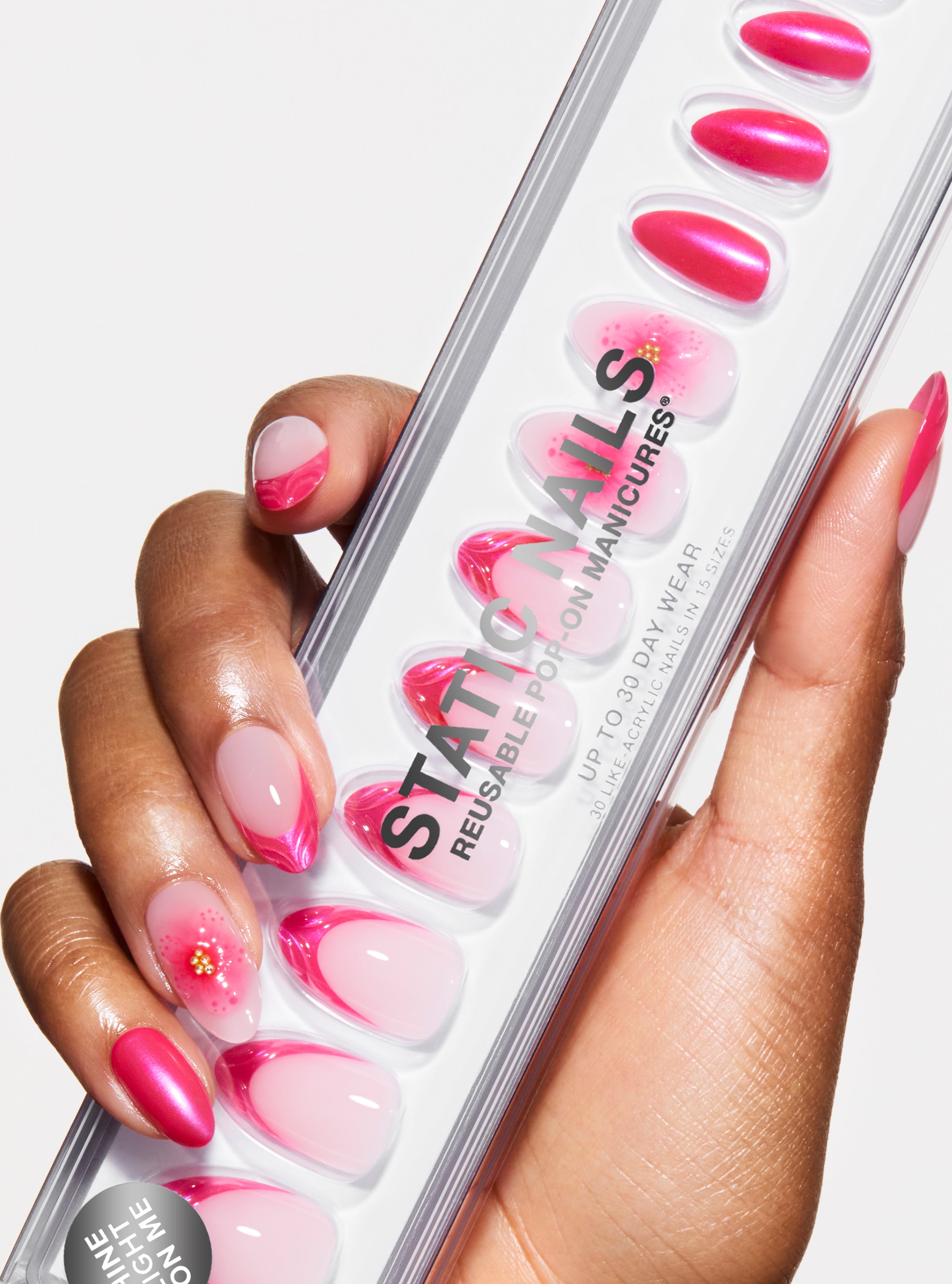 The best, most durable press-on nails. french manicure design with hot pink 3D shell french tip and 3D floral accent nail