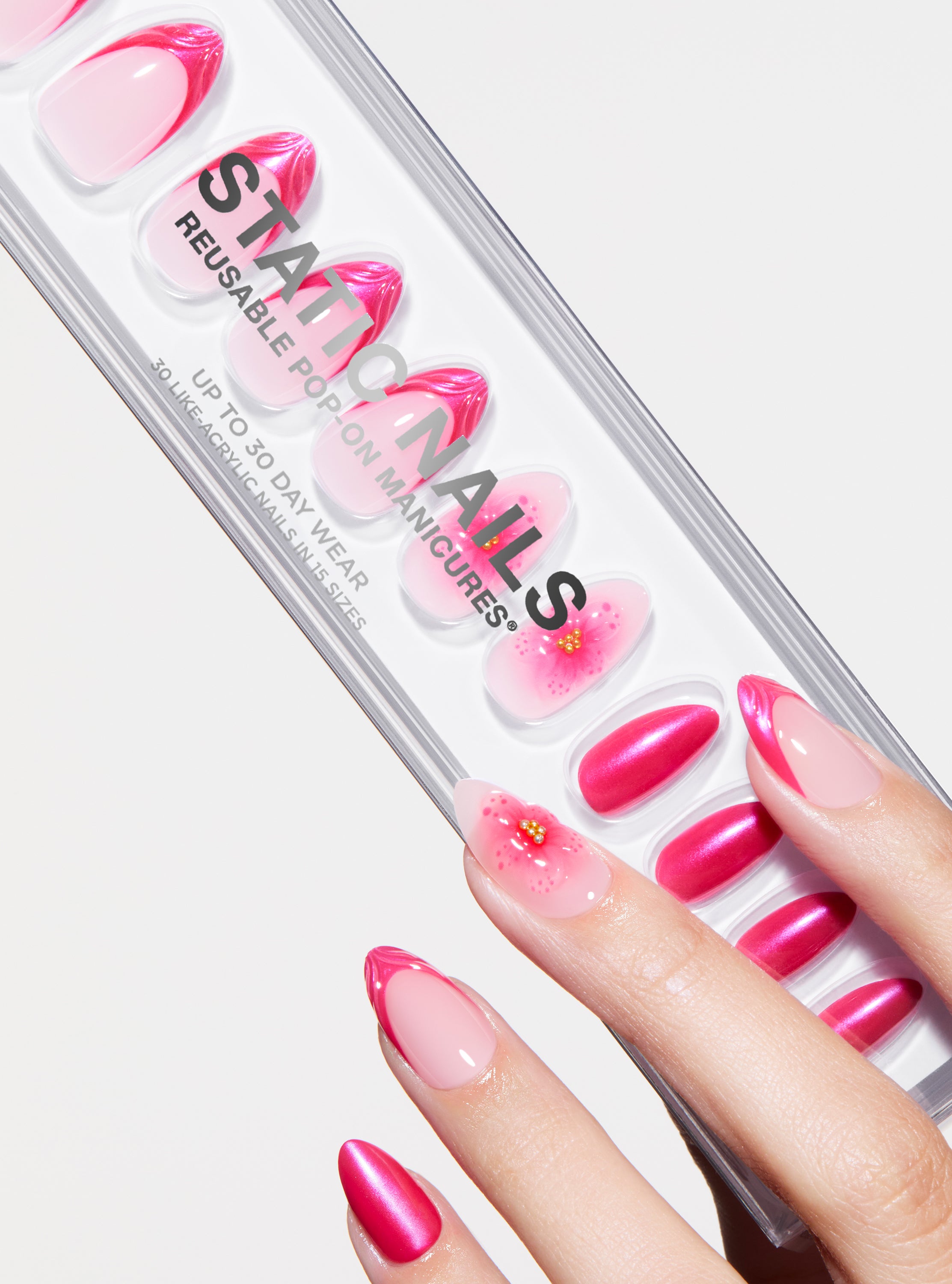 The best, most durable press-on nails. french manicure design with hot pink 3D shell french tip and 3D floral accent nail