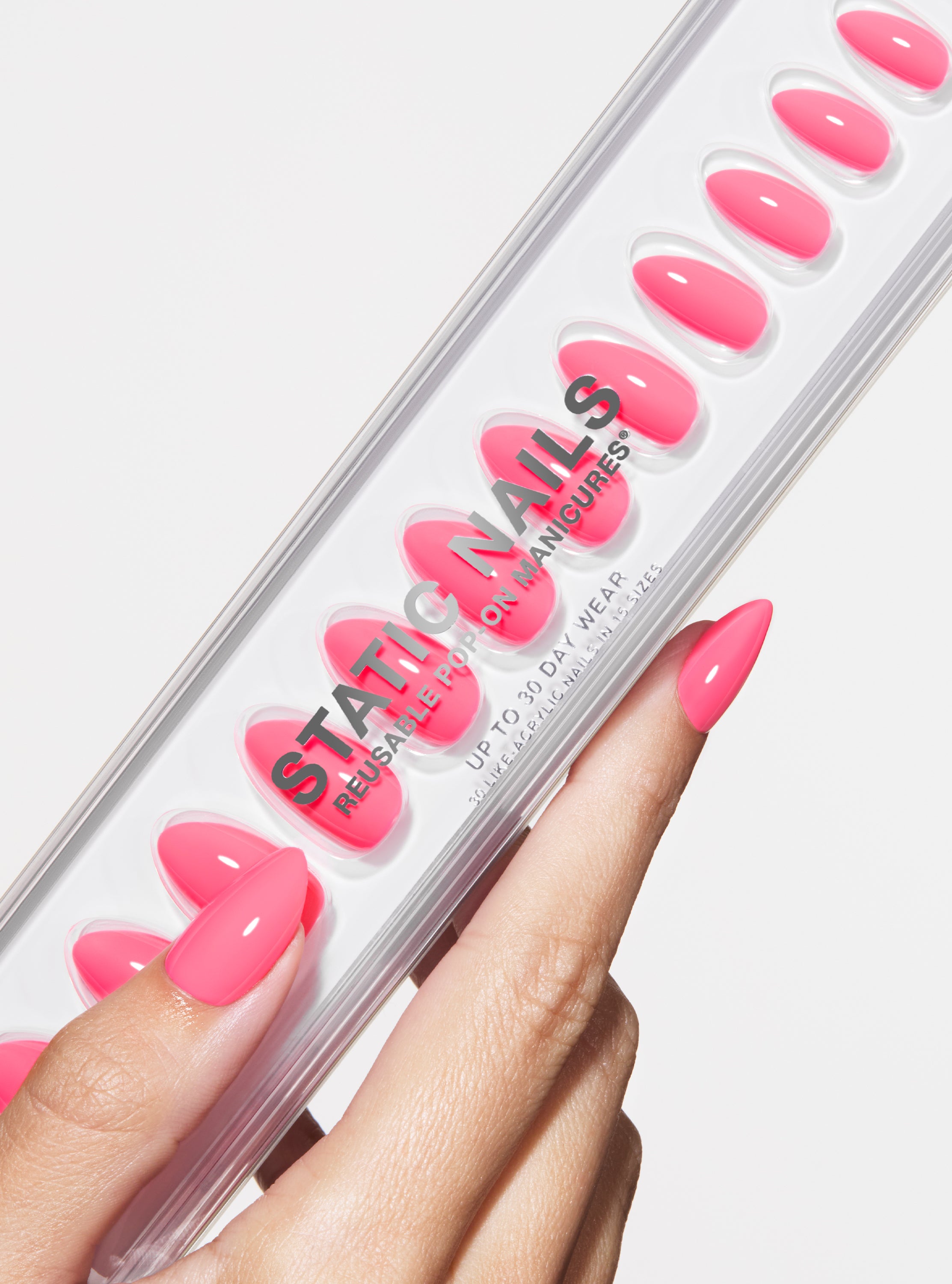 The best, most durable press-on nails. Neon pink almond nails