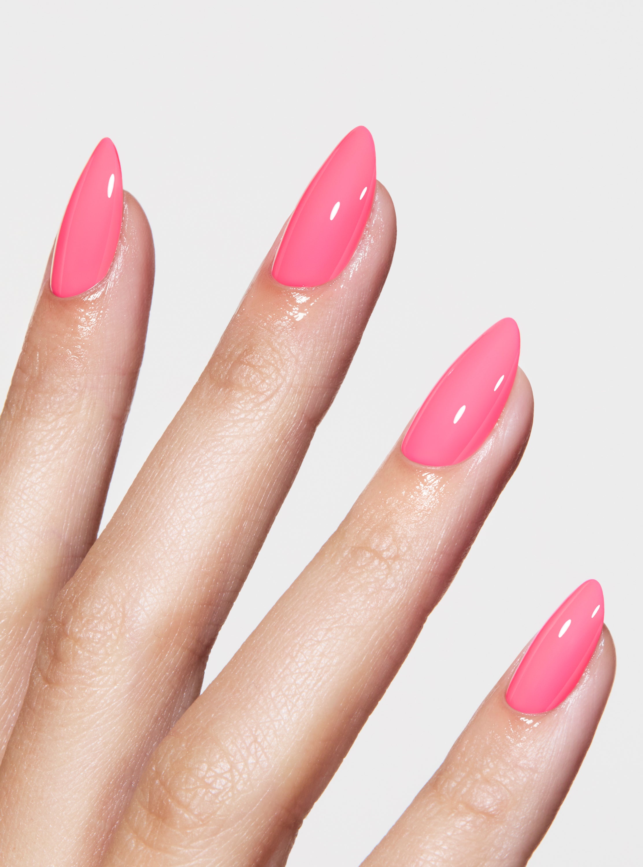 The best, most durable press-on nails. Neon pink almond nails