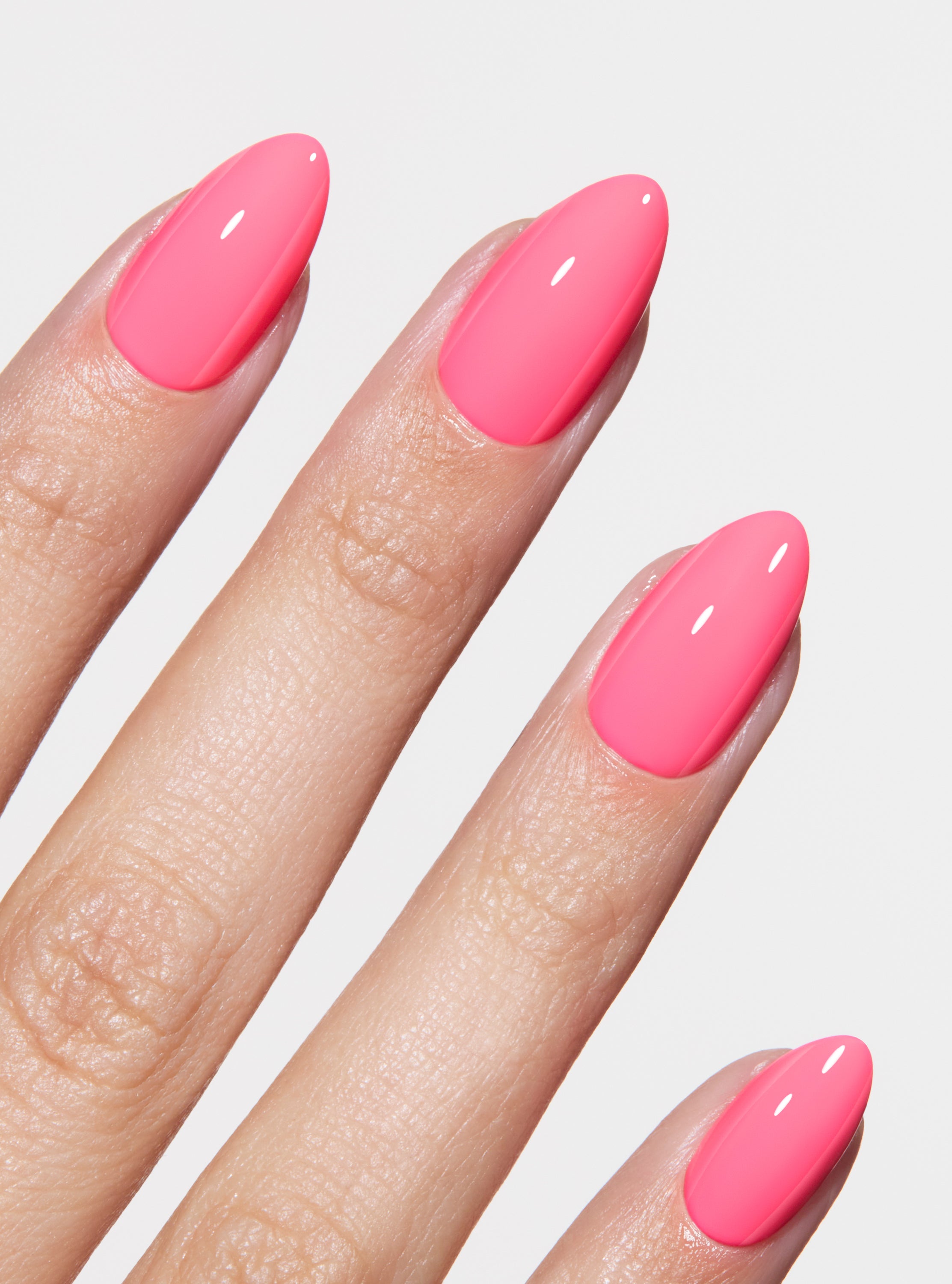 The best, most durable press-on nails. Neon pink almond nails