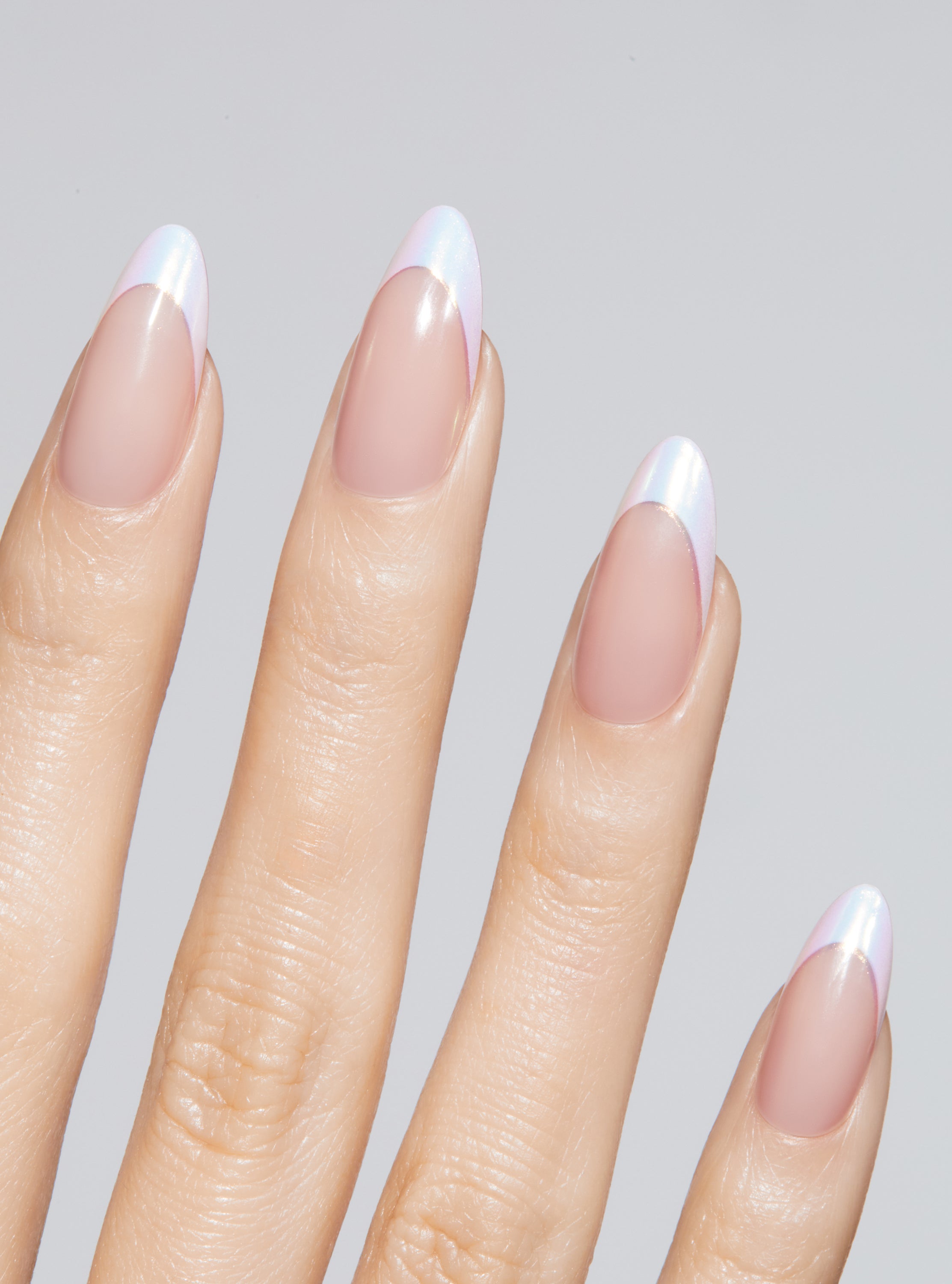 Iridescent holographic french manicure in almond shape,