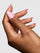 RIBBONS & BOWS MANI+PEDI SETHand with pink nail polish on a light gray background