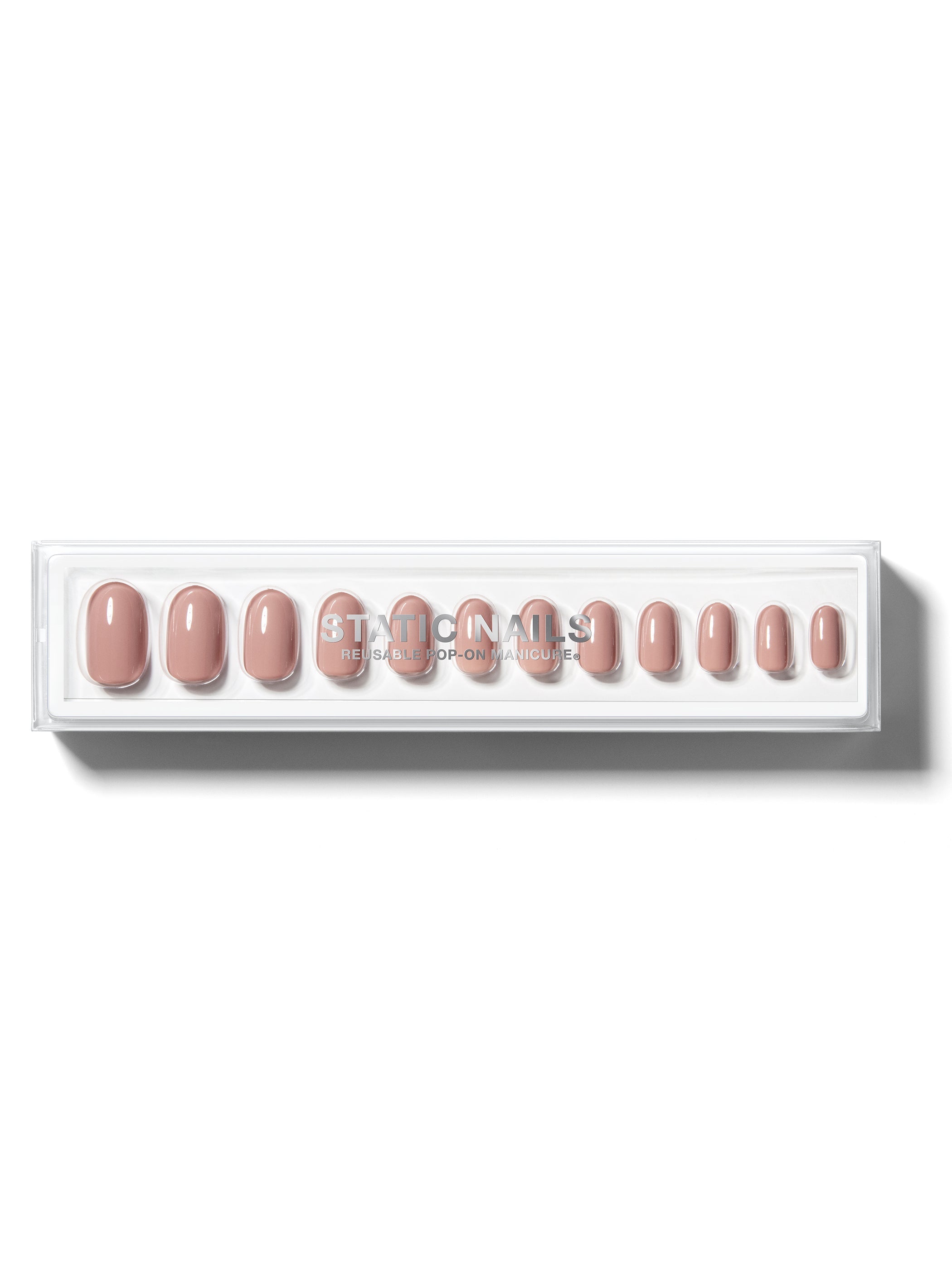 Blush-pink manicure in round shape,