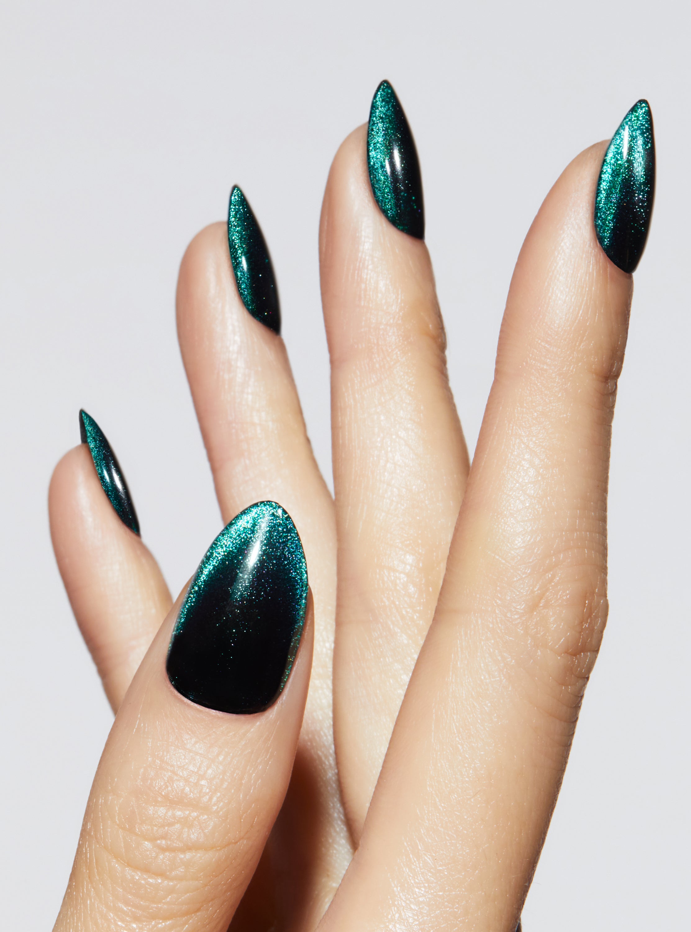 Black nail with green and gold velvet french tip