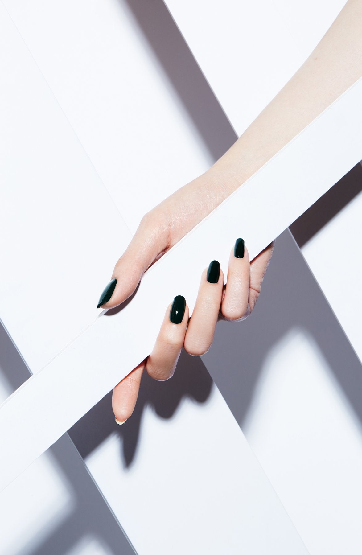 Deep emerald green, light