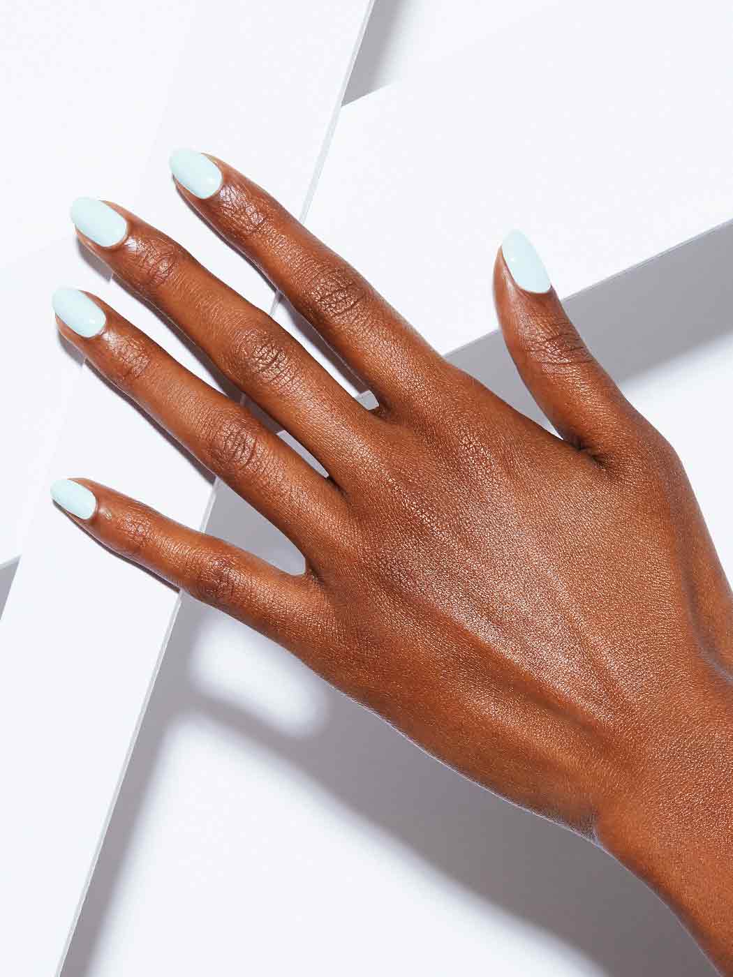 Soft mint blue with green undertones, Full coverage, Rich