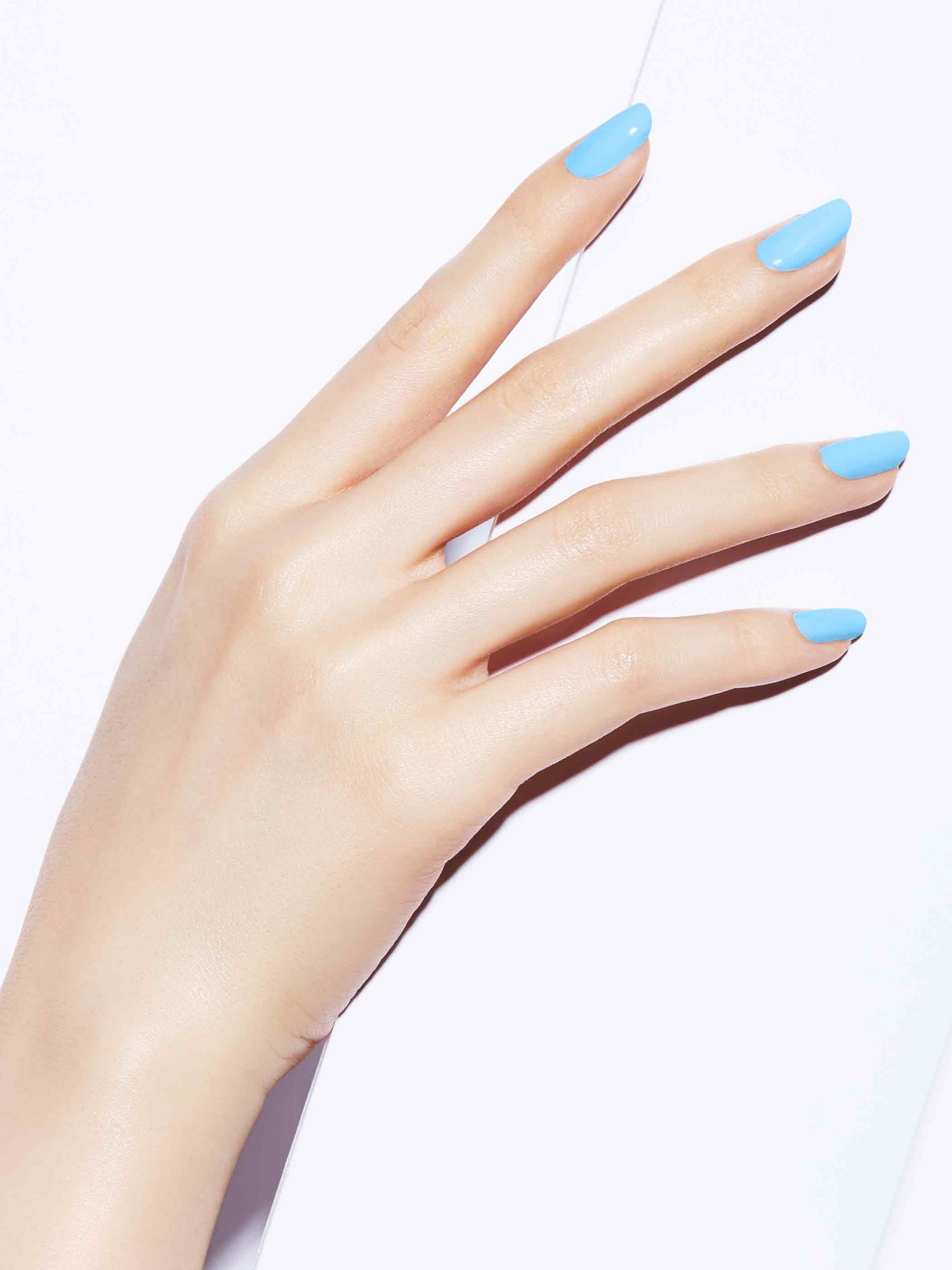 Neon pastel blue full-coverage nail polish, Light