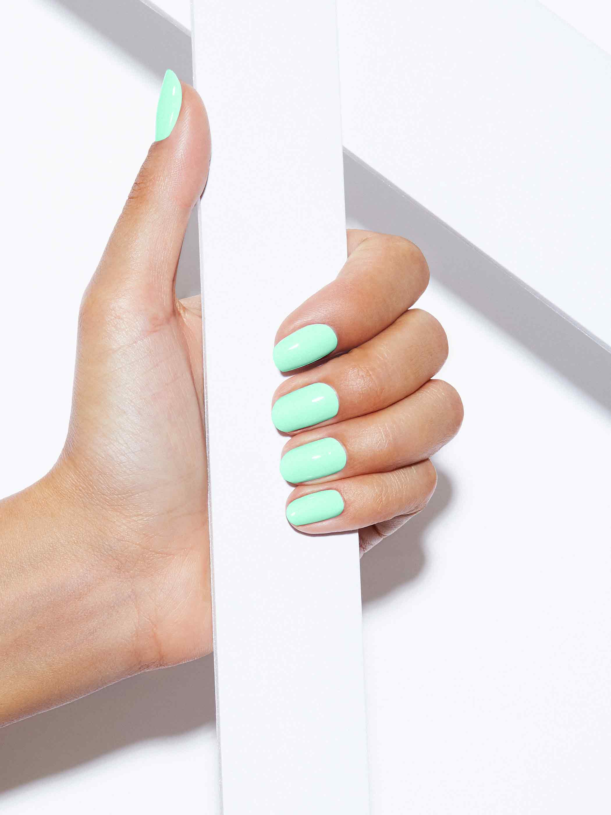 Neon pastel green full-coverage nail polish, Medium