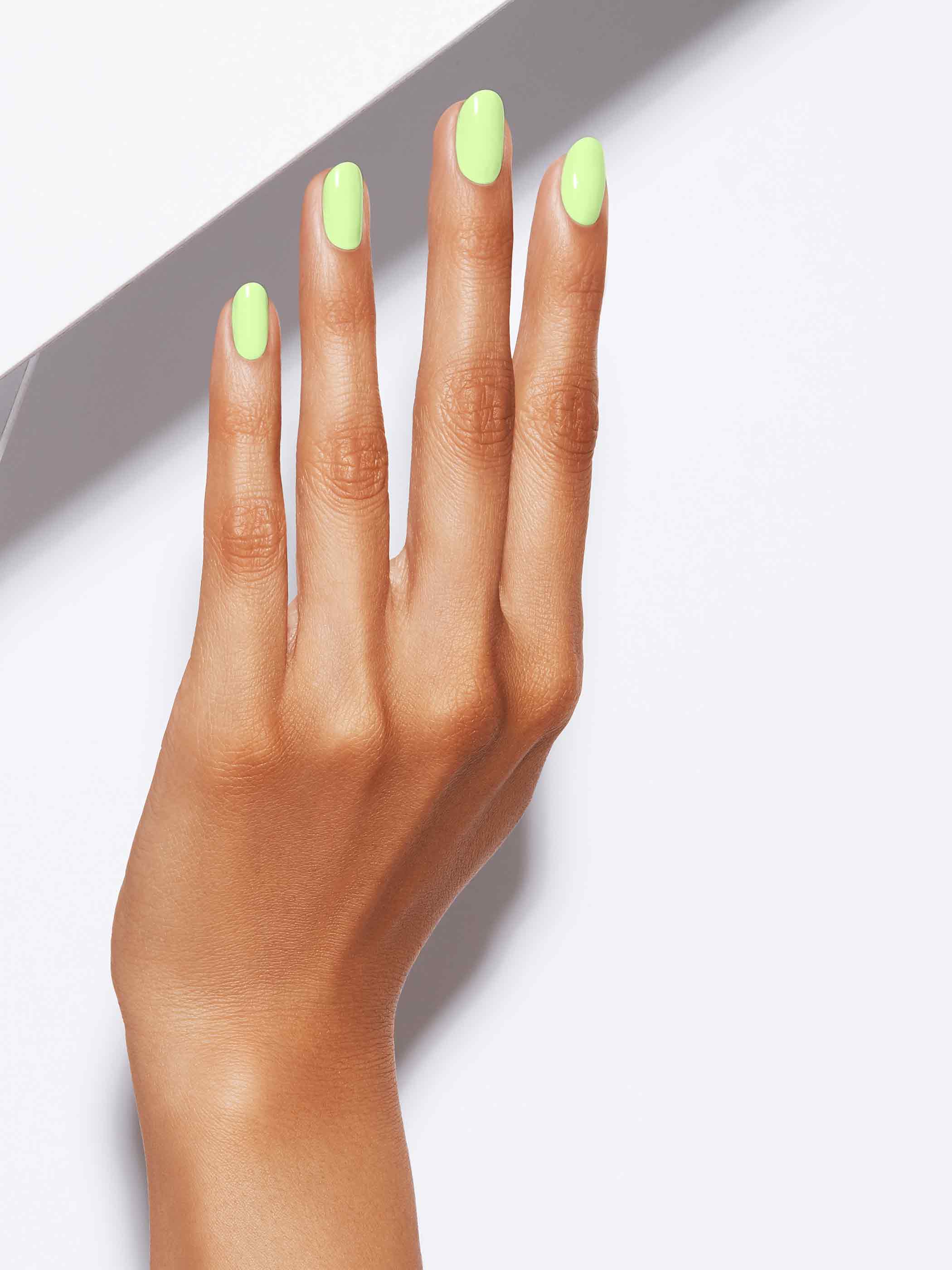Neon pastel yellow/green full-coverage nail polish, Medium