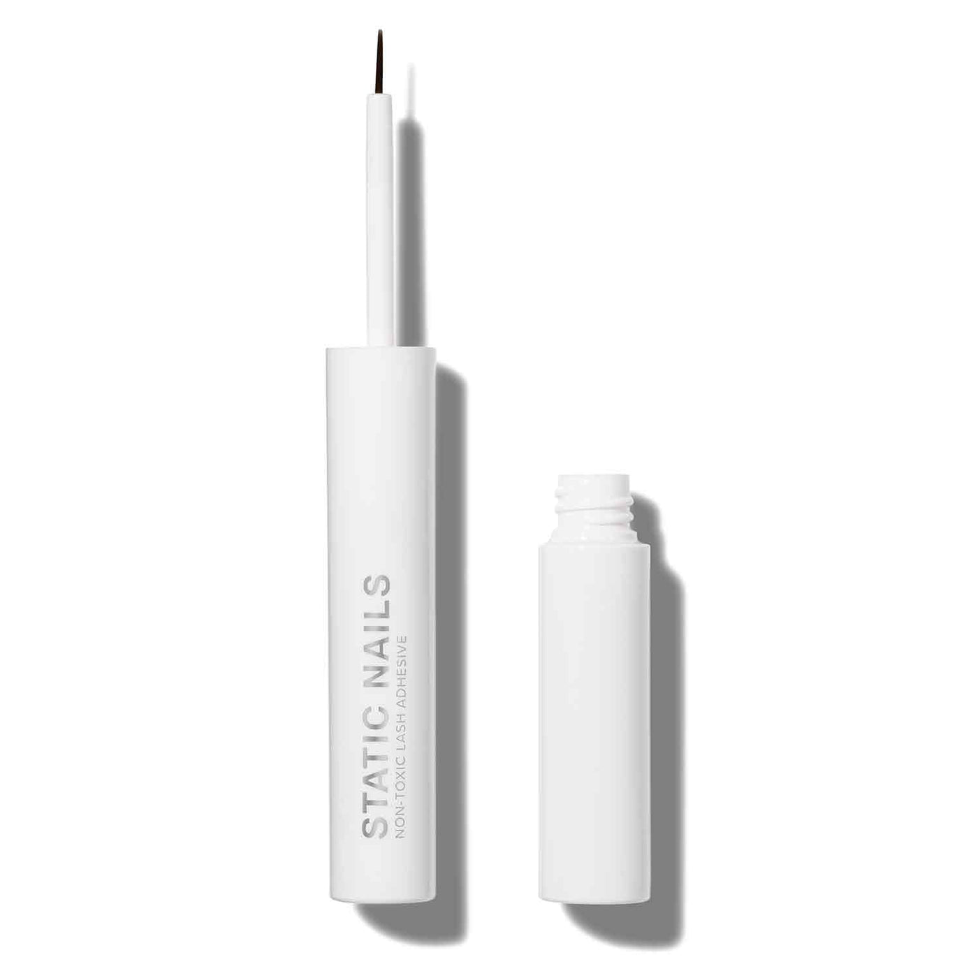 White liner bottle with wand and thin brush hairs, Lash_RightColumn