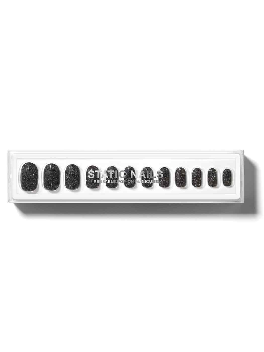 Dark grey/black nails with silver glitter in round shape,