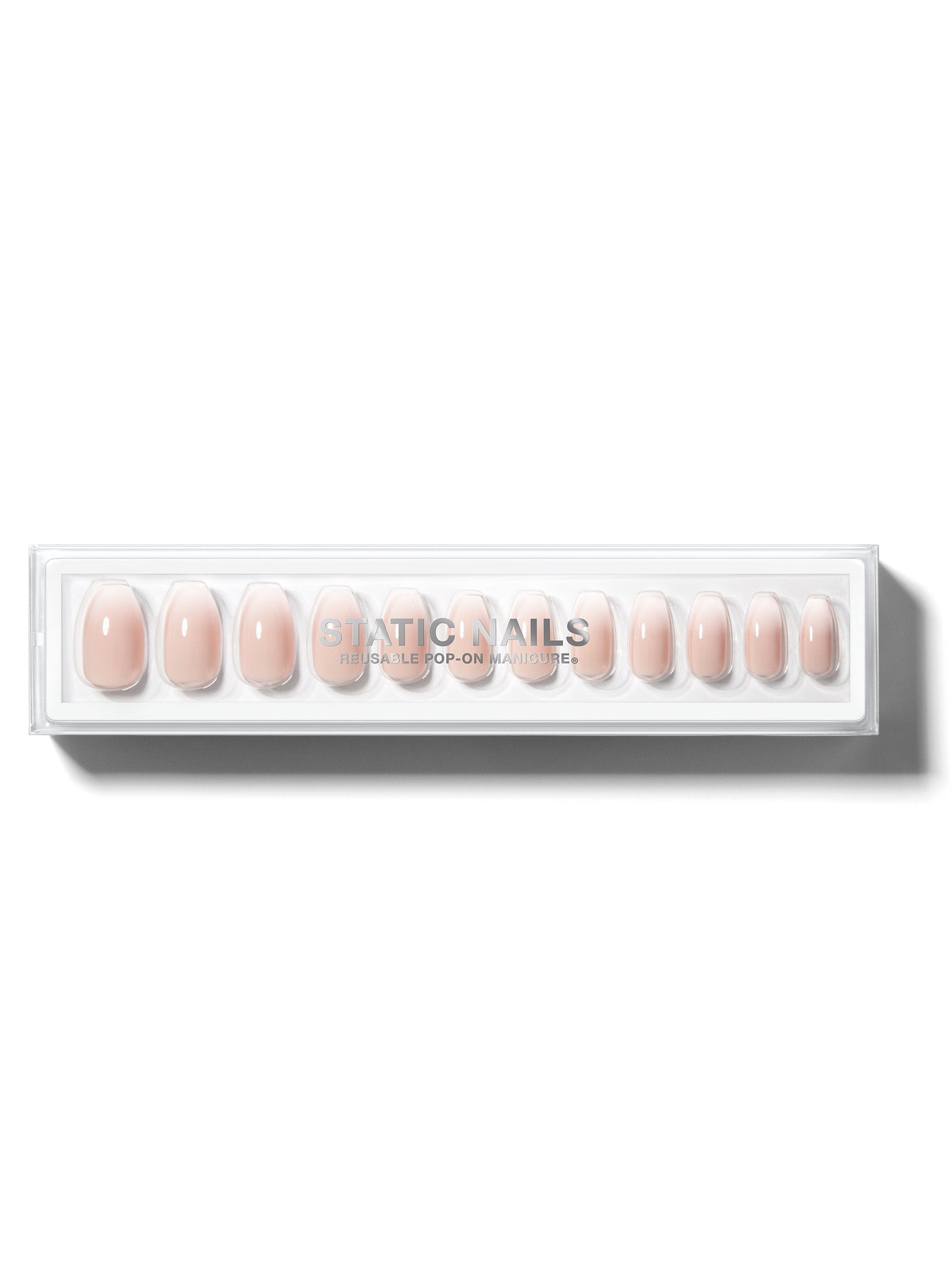 Ombre light pink to white manicure in coffin shape,