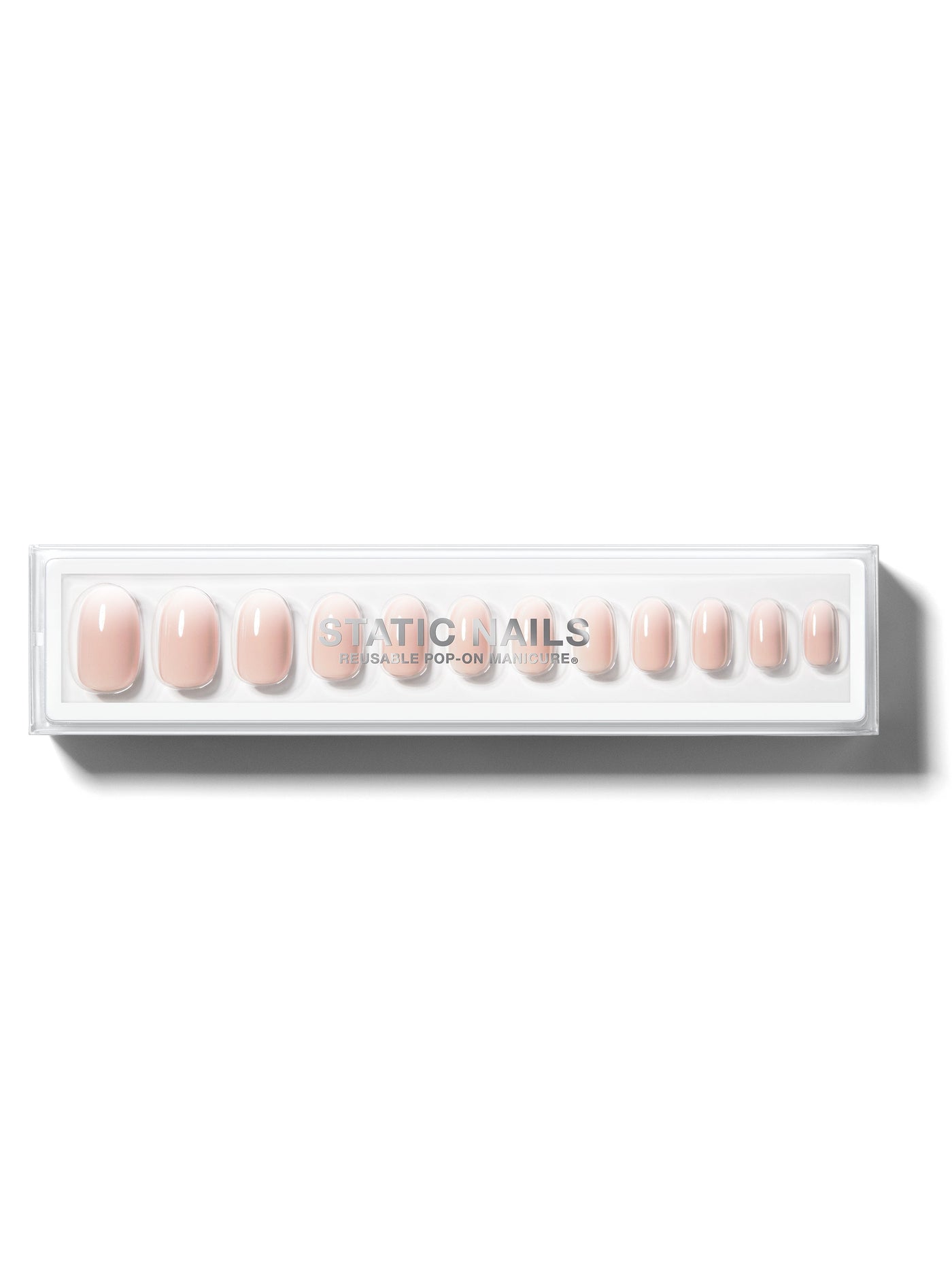 Ombre light pink to white manicure in round shape,