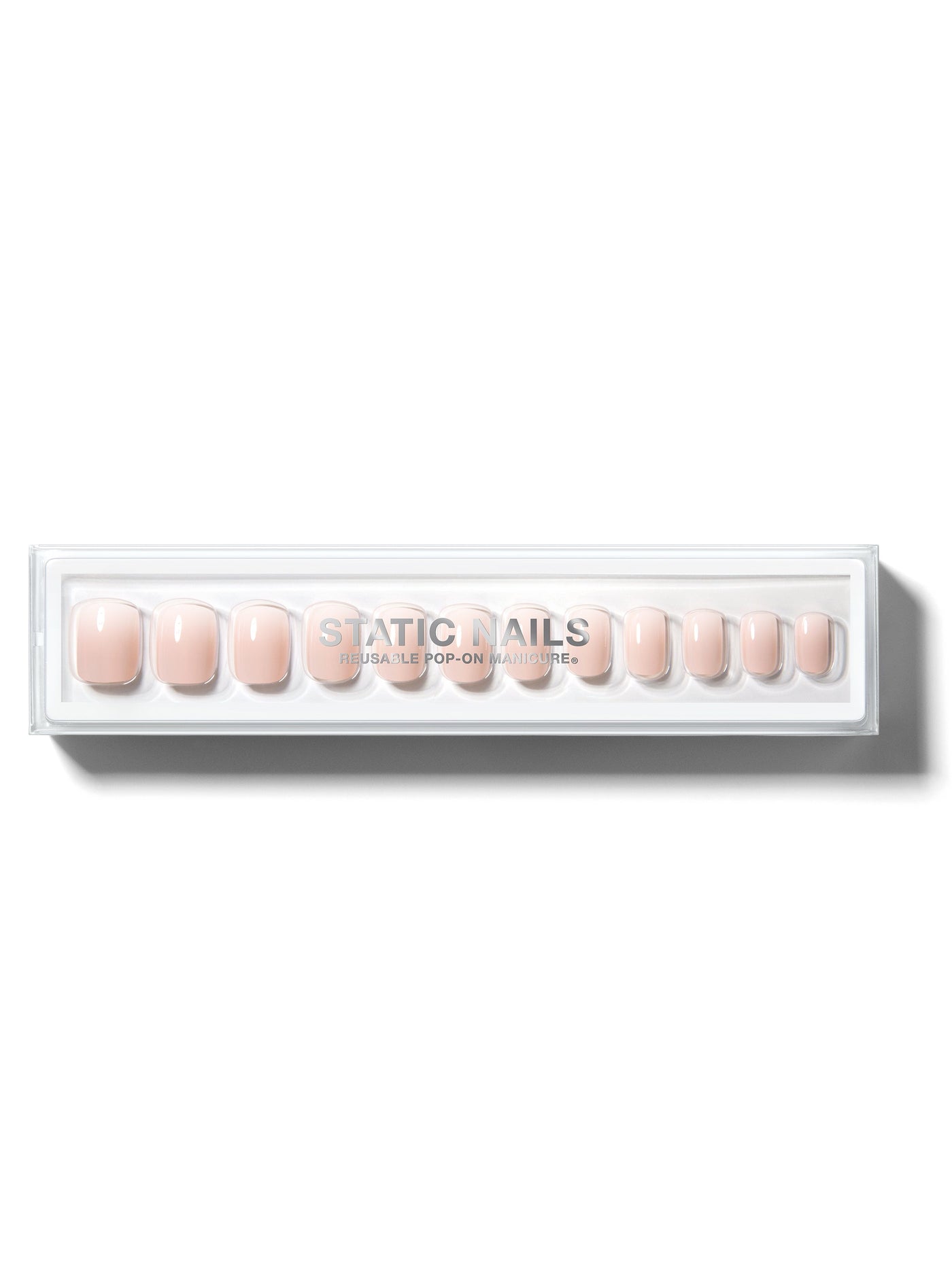 Ombre light pink to white manicure in short square shape,