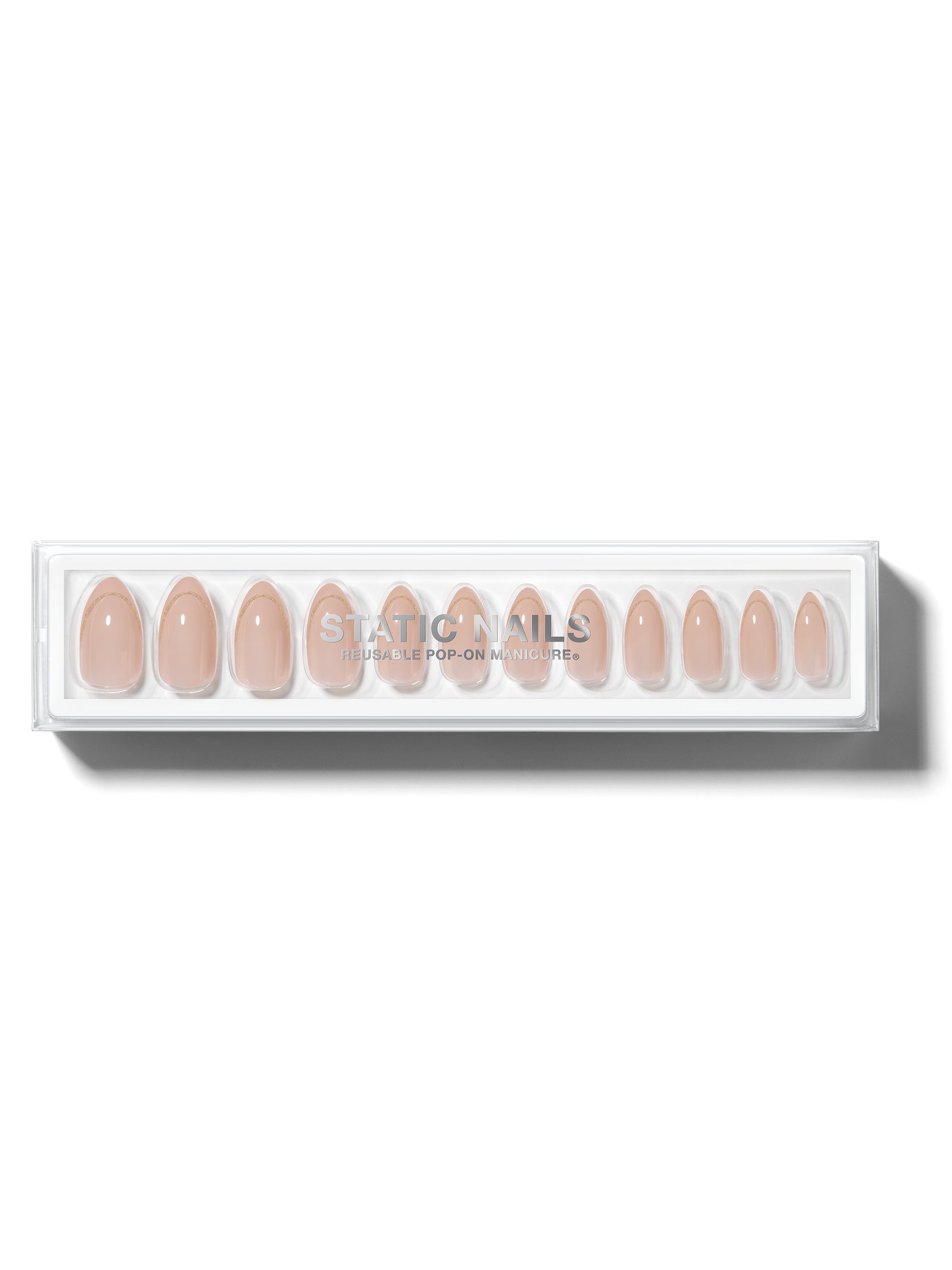 Nude manicure with single gold french accent on all nails in almond shape,