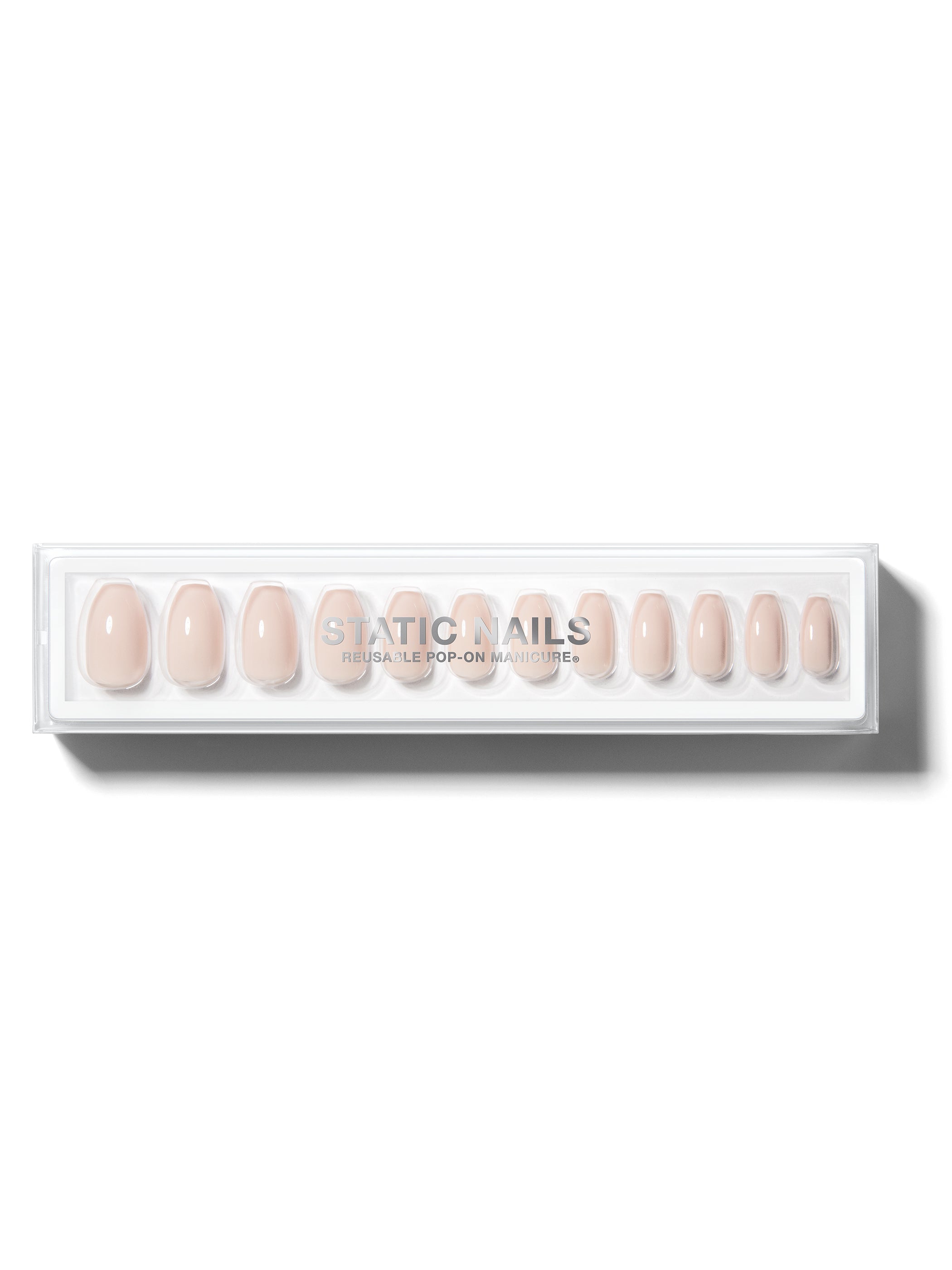 Pale pink manicure in coffin shape,