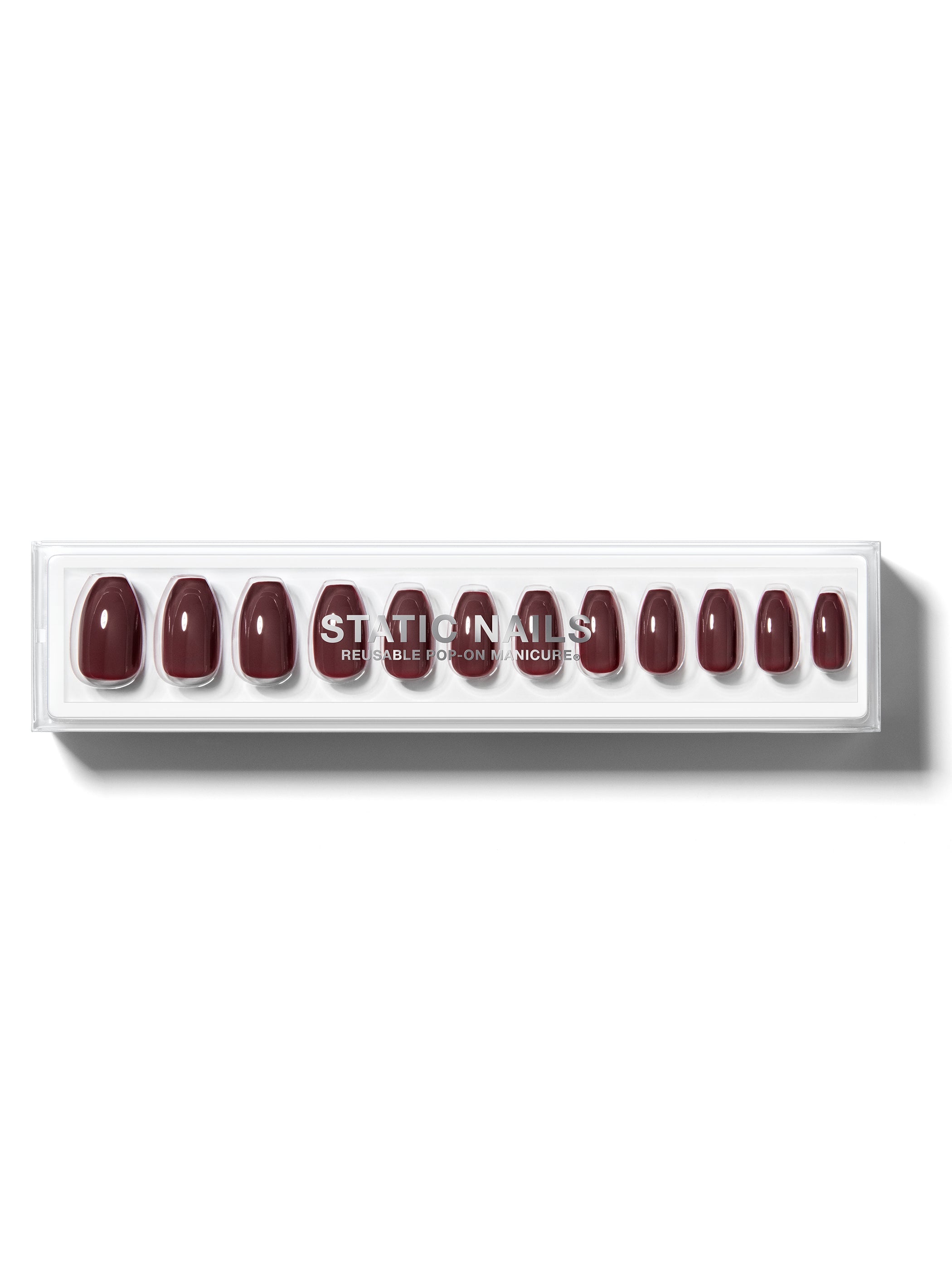 Deepest brown manicure in coffin shape,
