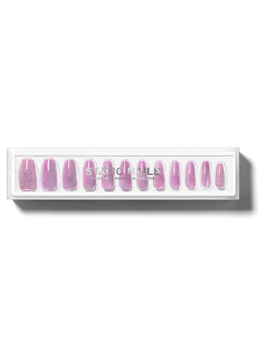 Lavender manicure with pink cat-eye effect in long coffin shape,