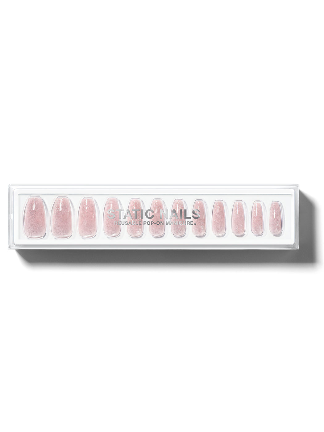 Soft pink manicure with silvery cat-eye effect in long coffin shape,